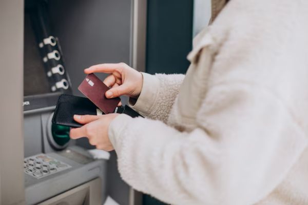 a person in an ATM looking for best banks in Istanbul