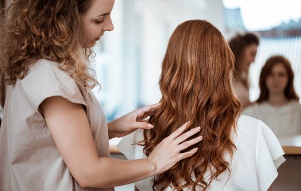 a hairdresser groping a client's hair in hair saloons in Istanbul