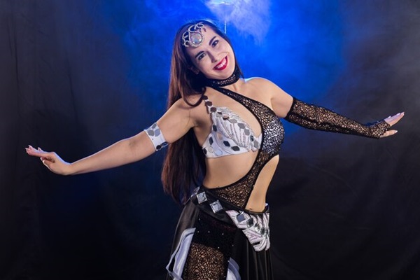 Girl belly dancing, fusion or tribal dancing