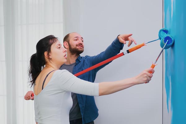 pair-paint-wall-apartment-paint-blue-brush-roller-renovation-apartments-construction-homes-while-renewing-improvement-repair-decoration
