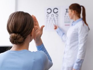 Doctor testing patient eyesight