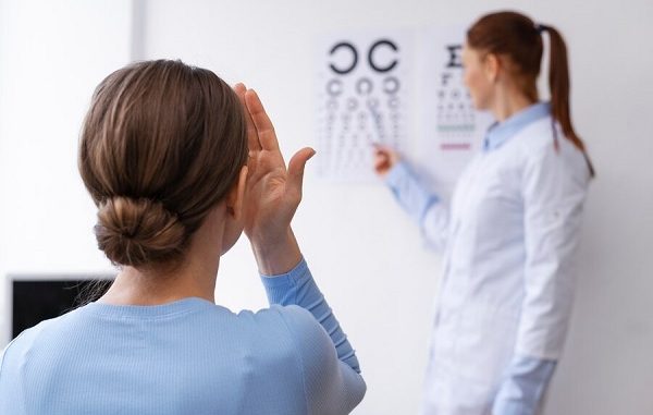 Doctor testing patient eyesight